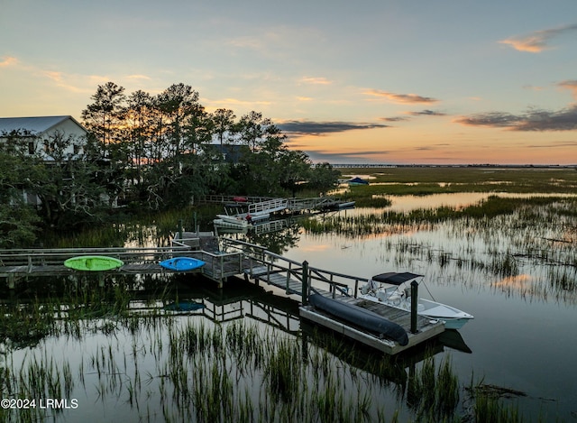 view of dock with a water view