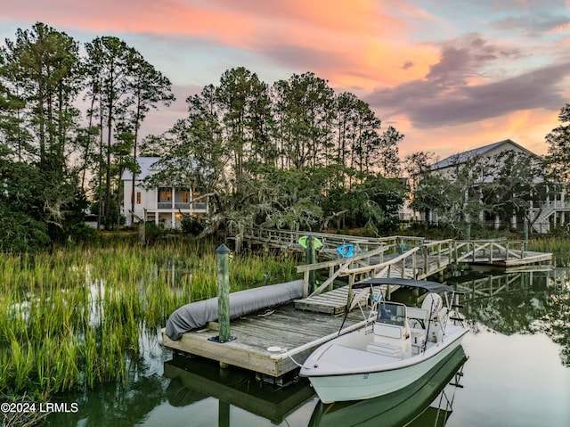 view of dock with a water view