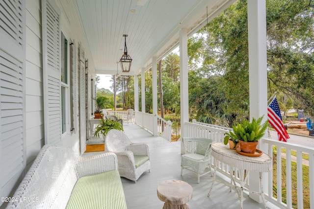 view of patio featuring a porch