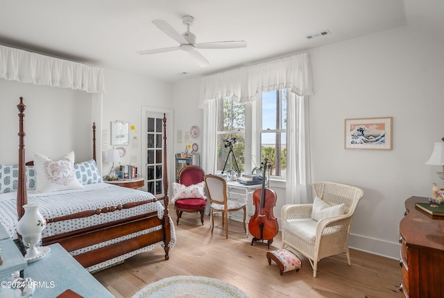 bedroom featuring wood-type flooring and ceiling fan