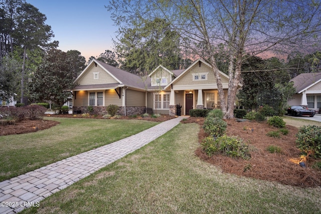 33 Little Pine Ct, Bluffton, SC 29910 - craftsman-style home with a lawn, stone siding, and a porch