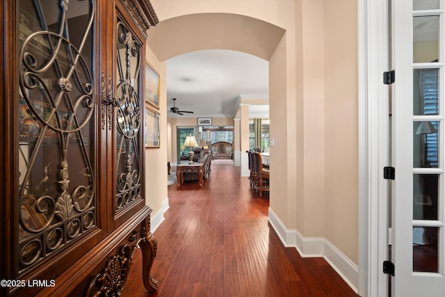 33 Little Pine Ct, Bluffton, SC 29910 - entrance foyer with baseboards, arched walkways, dark wood-type flooring, and ceiling fan