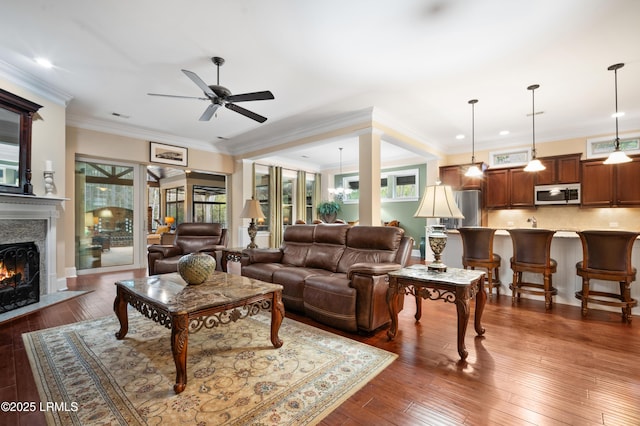 33 Little Pine Ct, Bluffton, SC 29910 - living room with hardwood / wood-style flooring, recessed lighting, a ceiling fan, and a premium fireplace