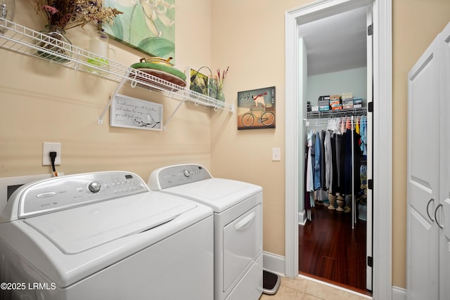 33 Little Pine Ct, Bluffton, SC 29910 - laundry room featuring baseboards, independent washer and dryer, laundry area, and light tile patterned floors