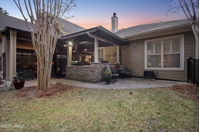 33 Little Pine Ct, Bluffton, SC 29910 - back of property featuring a chimney, a yard, and a patio