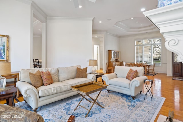 67 Winding Oak Dr, Okatie, SC 29909 - living room with ornamental molding, light wood-style floors, a ceiling fan, a tray ceiling, and recessed lighting