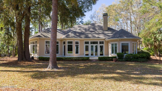 67 Winding Oak Dr, Okatie, SC 29909 - rear view of property featuring a chimney and a lawn