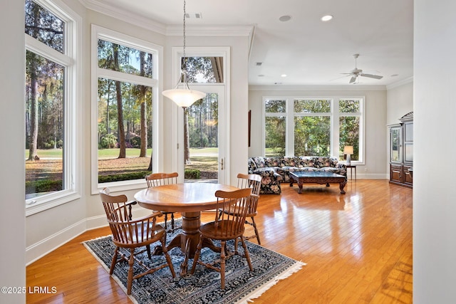 67 Winding Oak Dr, Okatie, SC 29909 - dining space with healthy amount of natural light, light wood finished floors, crown molding, ceiling fan, and recessed lighting