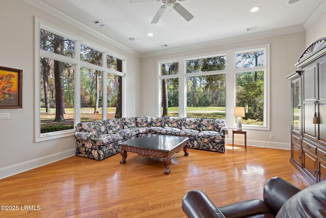 67 Winding Oak Dr, Okatie, SC 29909 - living area featuring healthy amount of natural light, baseboards, ceiling fan, crown molding, and recessed lighting