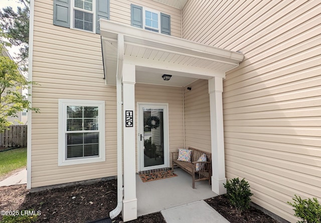 120 Wall St, Savannah, GA 31405 - doorway to property with a porch and fence