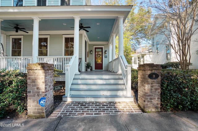 entrance to property featuring ceiling fan and covered porch