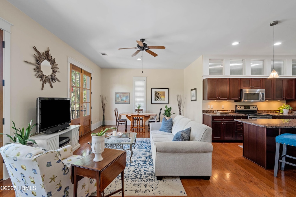 150 Cherokee Farms Rd Unit 2A, Beaufort, SC 29906 - living area featuring wood finished floors, ceiling fan, visible vents, and recessed lighting