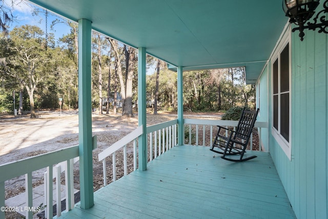 wooden deck with a porch