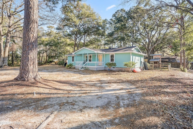 view of front of home featuring covered porch