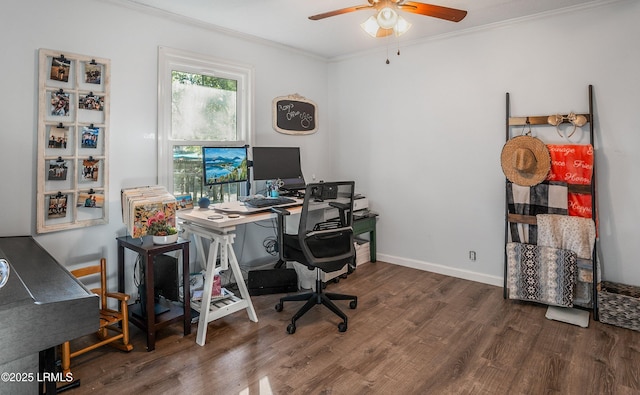 office featuring crown molding, dark wood-type flooring, and ceiling fan