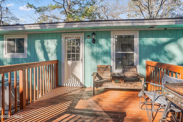 doorway to property featuring a deck