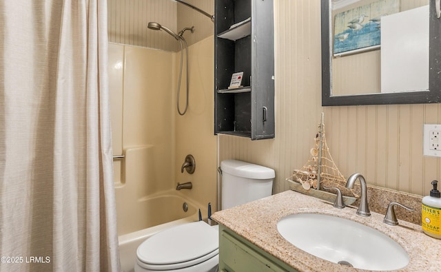 full bathroom with wood walls, vanity, shower / bathtub combination with curtain, and toilet