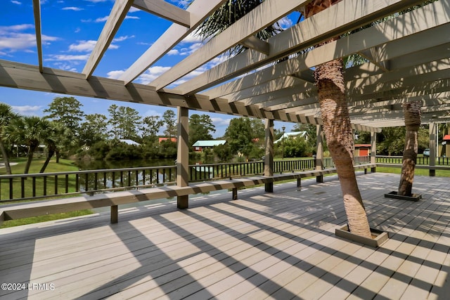 wooden deck with a pergola