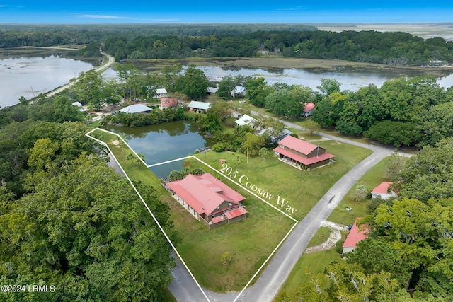 birds eye view of property featuring a water view