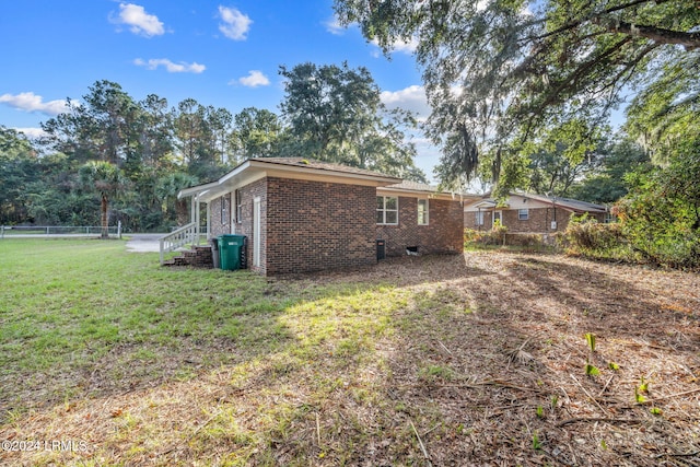 exterior space with a lawn