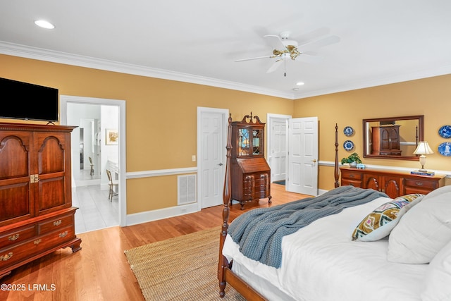 bedroom featuring ornamental molding, visible vents, recessed lighting, and light wood-type flooring