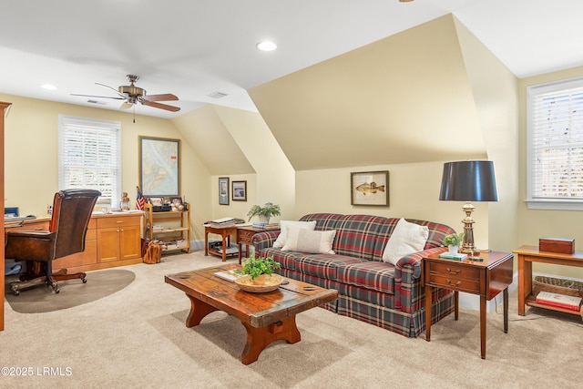 living room featuring lofted ceiling, light colored carpet, recessed lighting, visible vents, and a ceiling fan