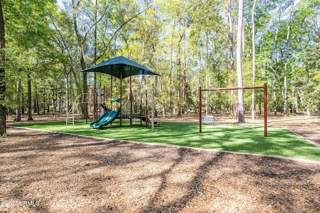 community play area featuring a lawn