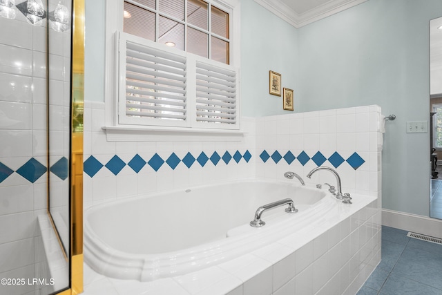 bathroom with ornamental molding, visible vents, a garden tub, and tile patterned flooring