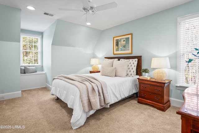 carpeted bedroom featuring baseboards, visible vents, vaulted ceiling, and recessed lighting