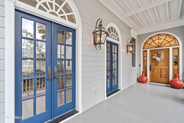 property entrance featuring french doors