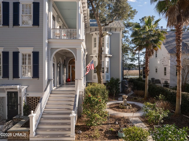 view of front of home with a balcony