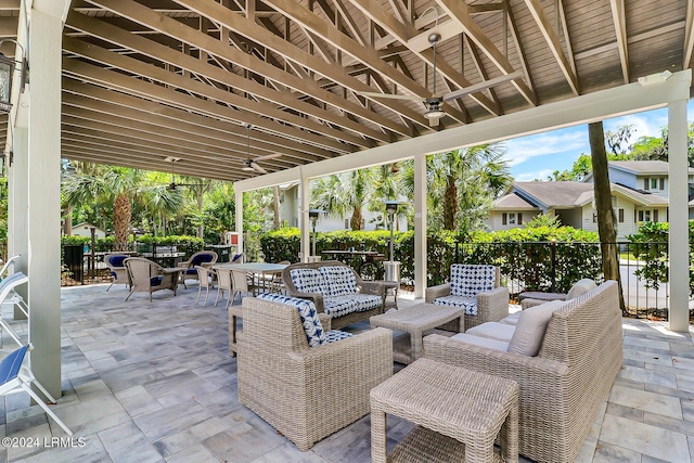 view of patio / terrace with an outdoor living space and ceiling fan