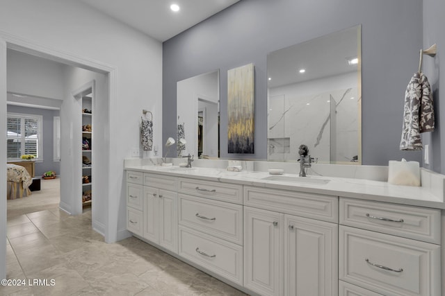 bathroom with vanity and walk in shower