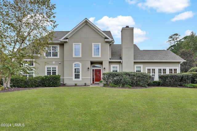 view of front of home with a front yard