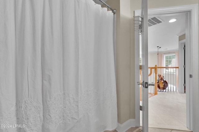 bathroom featuring tile patterned flooring