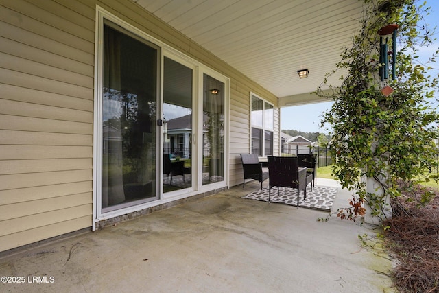 view of patio with fence