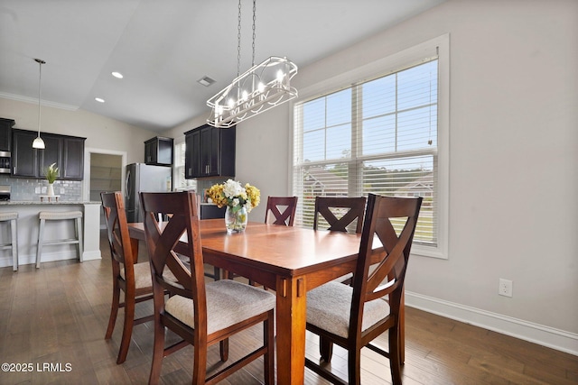 dining space featuring lofted ceiling, baseboards, visible vents, recessed lighting, and dark wood-style flooring