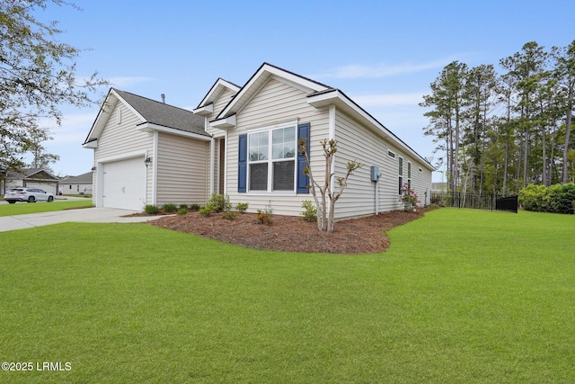 view of front of house featuring driveway, a garage, and a front lawn