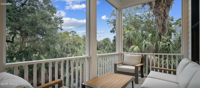 sunroom featuring a wealth of natural light