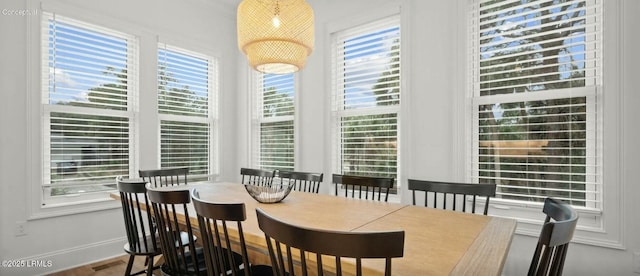dining room featuring baseboards and visible vents