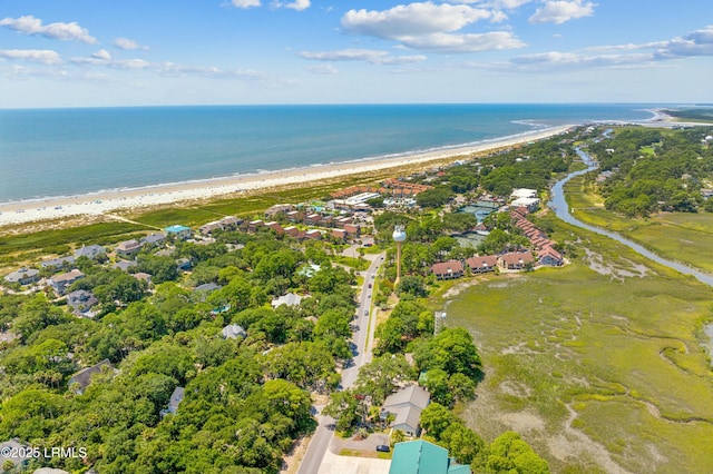 aerial view featuring a water view and a beach view