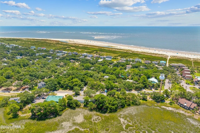 bird's eye view with a water view and a view of the beach