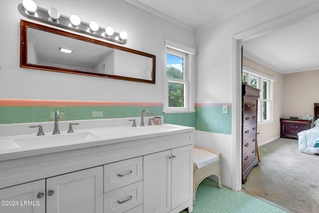 bathroom with crown molding and vanity