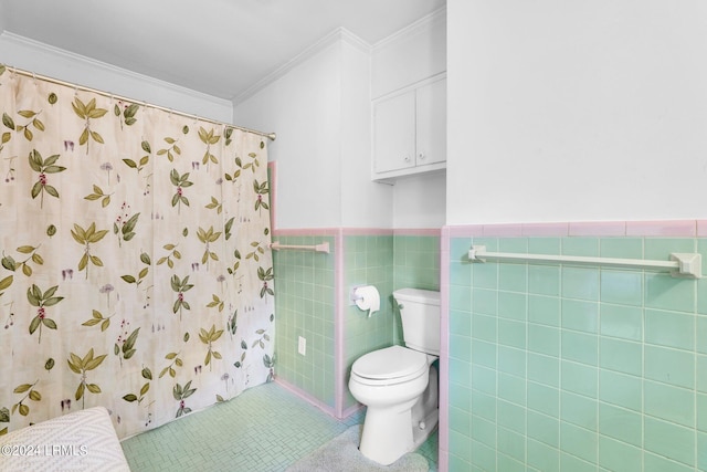 bathroom featuring walk in shower, tile patterned floors, toilet, tile walls, and ornamental molding