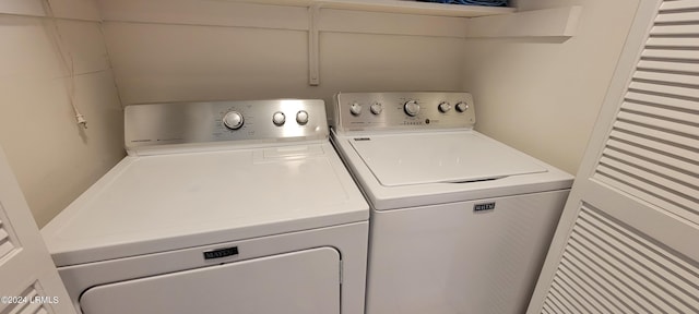 washroom with washer and clothes dryer