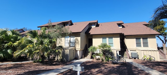 view of front of property with cooling unit