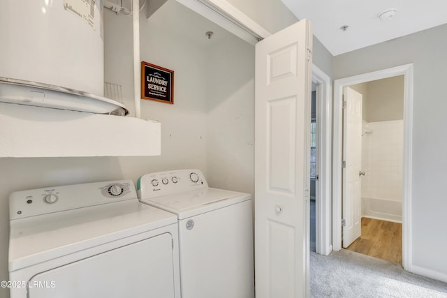 112 Union Cemetery Rd Unit 228, Hilton Head Island, SC 29926 - laundry area featuring light carpet and washing machine and clothes dryer