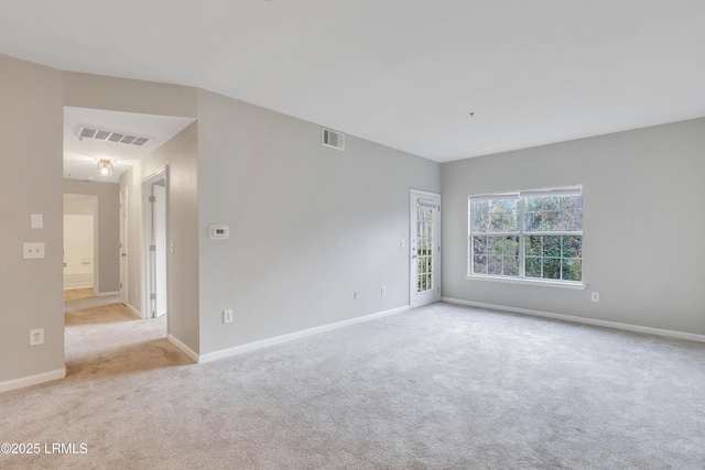 view of carpeted spare room