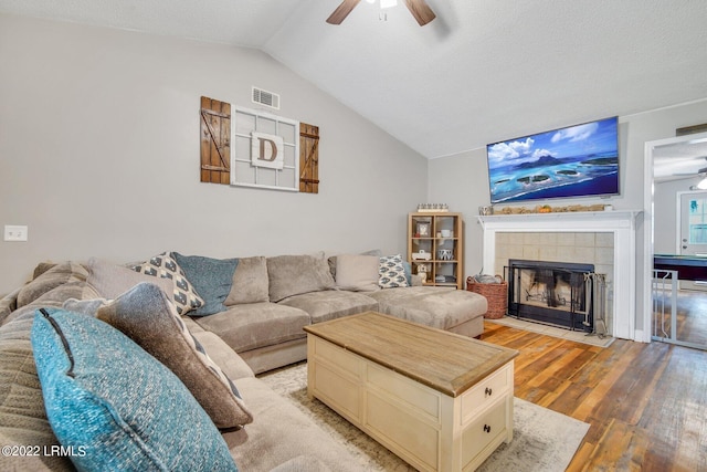5 Folson Ct, Beaufort, SC 29907 - living room with ceiling fan, wood finished floors, lofted ceiling, and a tile fireplace
