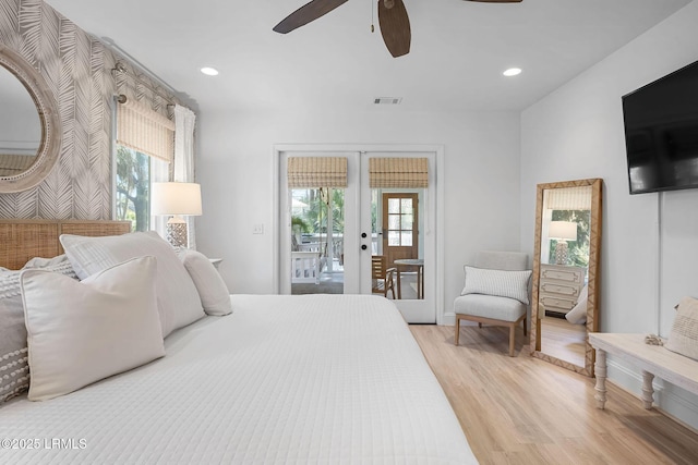 bedroom featuring access to outside, french doors, recessed lighting, visible vents, and light wood-type flooring